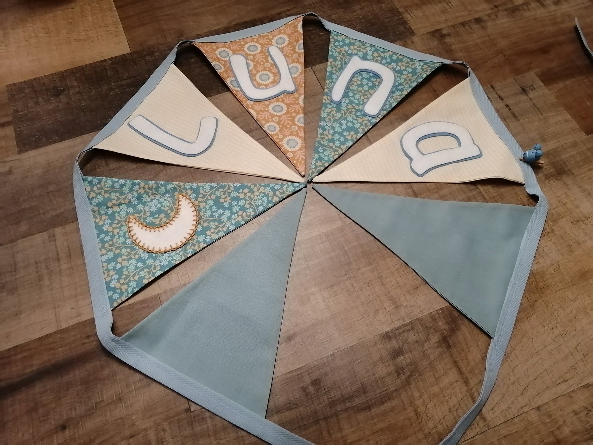Naamslinger als kraamcadeau