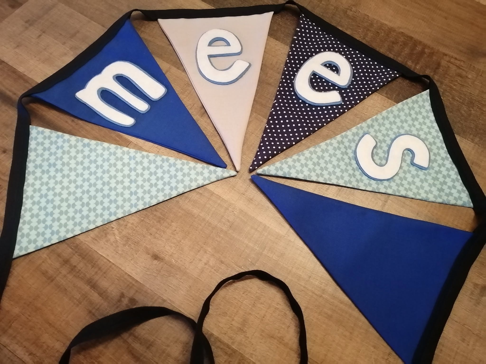 Naamslinger op maat gemaakt
